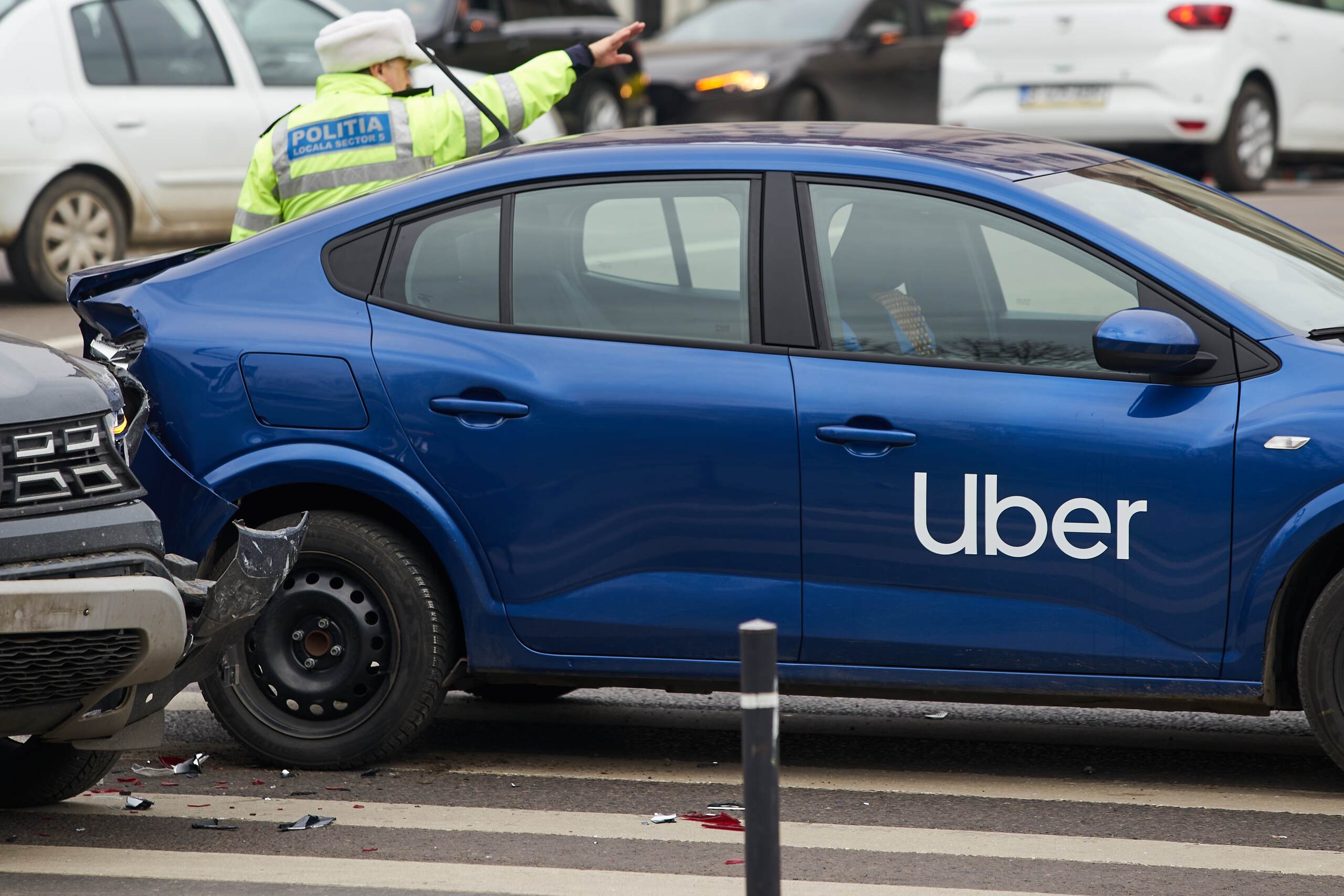 Uber vehicle involved in a collision with police directing traffic, illustrating limited tort insurance issues in a Scranton rideshare accident.