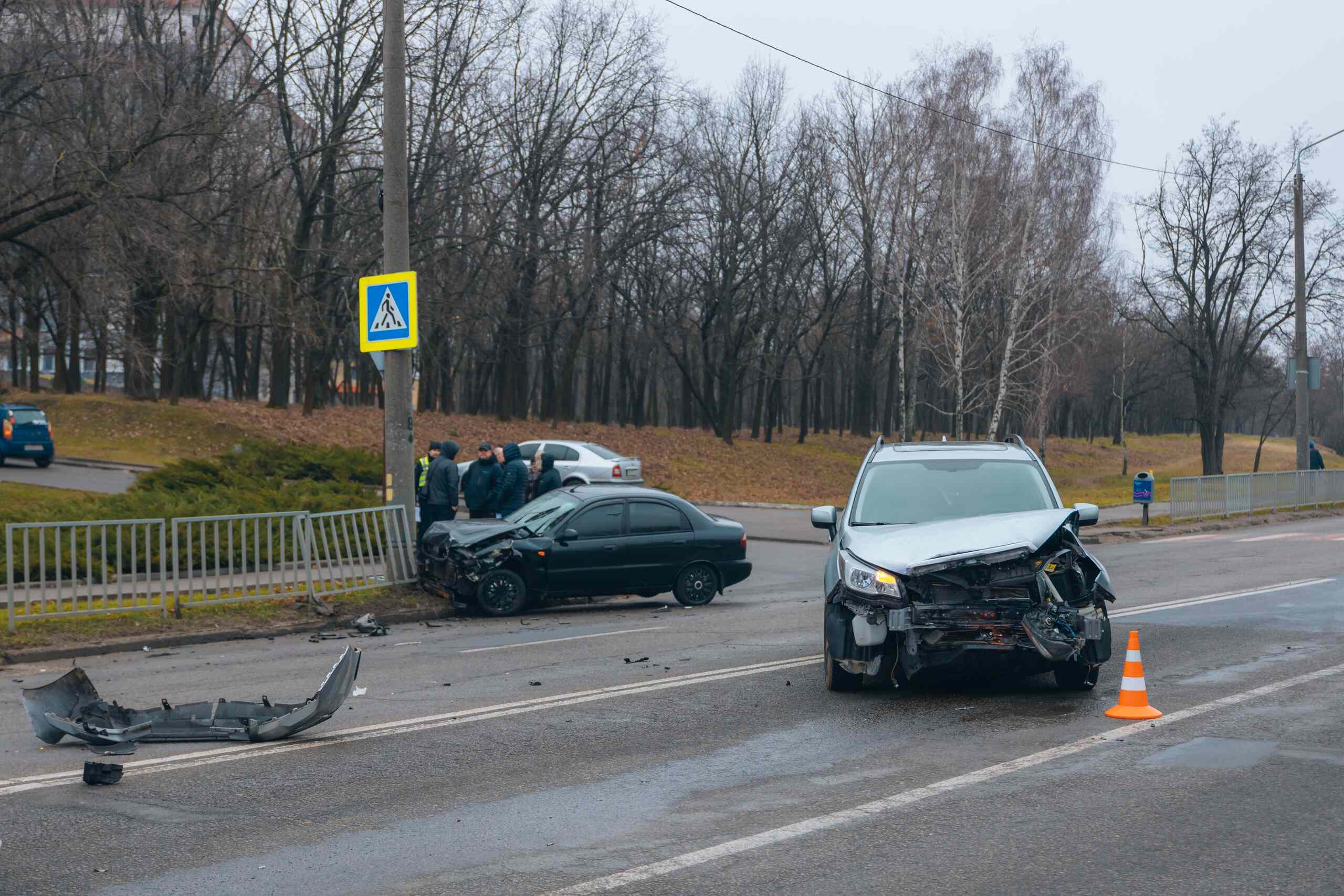 Two damaged vehicles after a collision, illustrating a Scranton car accident where fault may be shared between drivers.