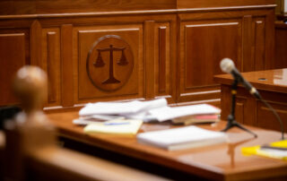 Pennsylvania courtroom setting with judge’s bench and scales of justice symbolizing the trial process in Scranton legal cases.