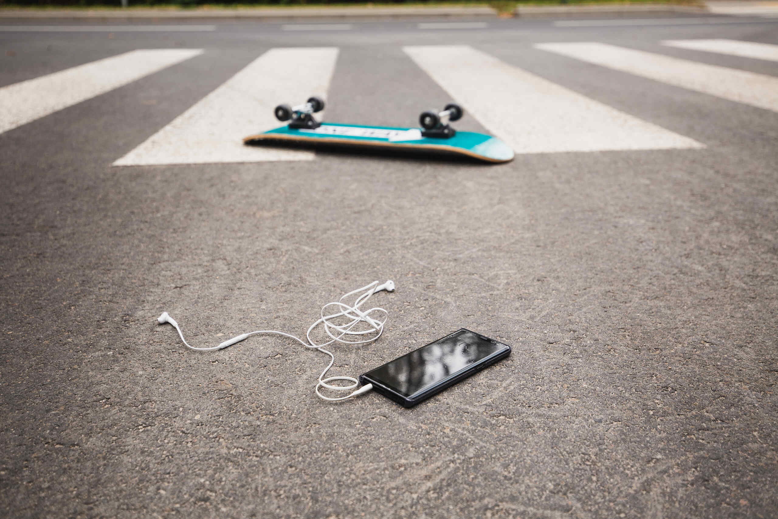 Personal belongings left at the scene of a crash, highlighting the immediate aftermath where a hit and run pedestrian lawyer in Scranton works to secure evidence before it disappears.