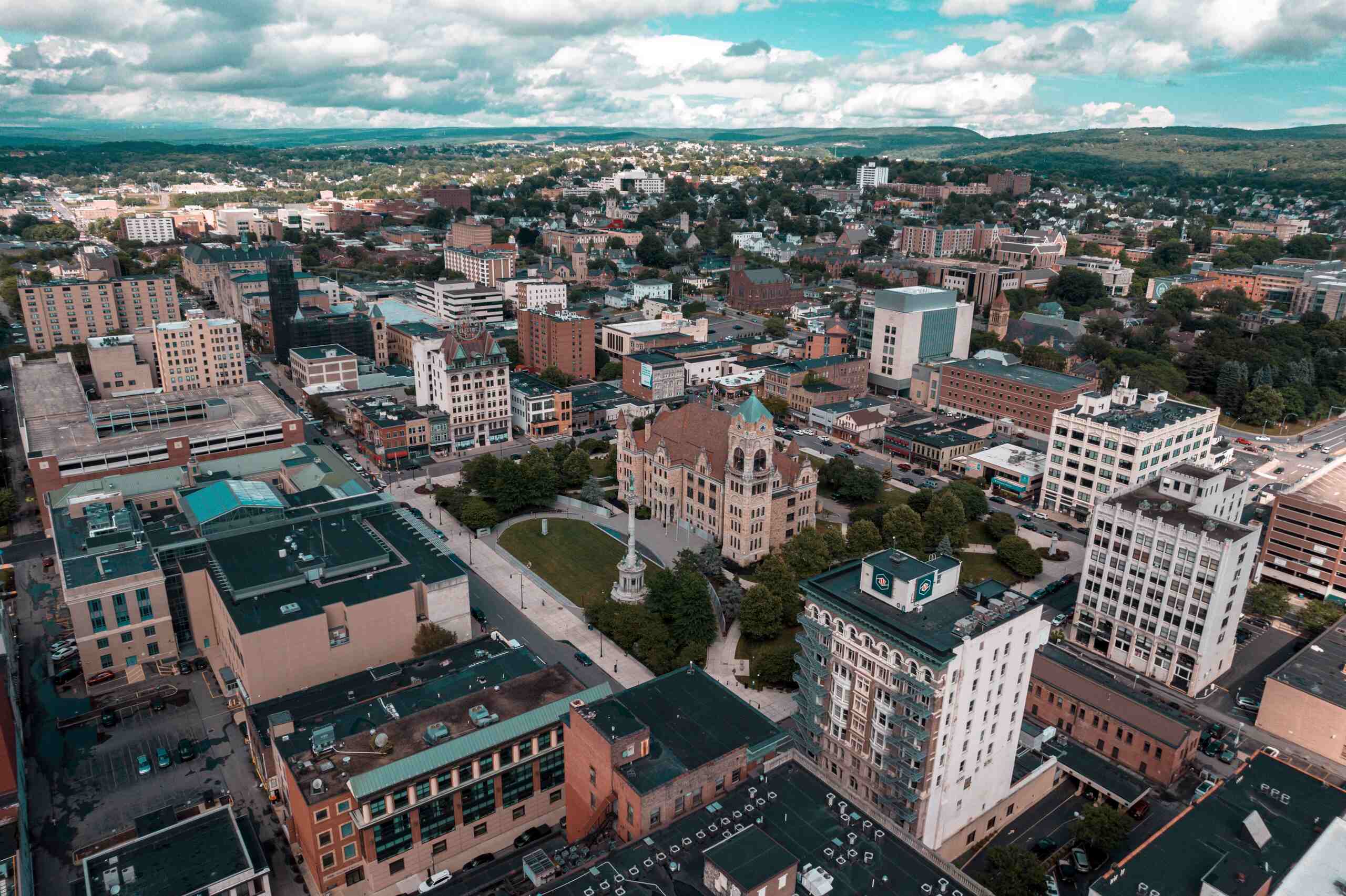 An aerial view of downtown Scranton, Pennsylvania, showing the historic courthouse square and surrounding city buildings, highlighting the local area served by Scranton slip and fall lawyers.