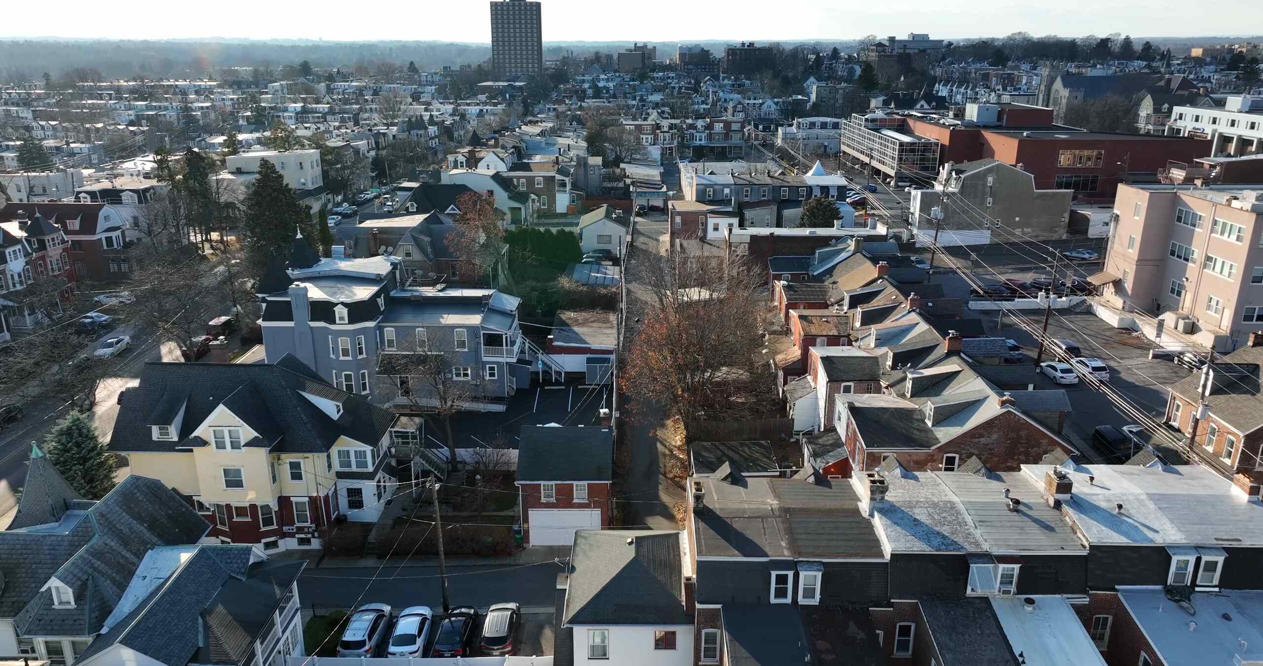 Aerial view of residential streets and buildings in a Pennsylvania city.